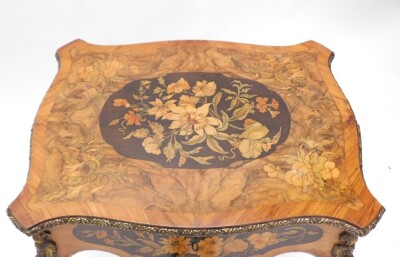 A 19thC Continental walnut and floral marquetry work table, with gilt metal mounts, the hinged quarter veneered kingwood crossbanded top enclosing a fitted interior, on cabriole legs with sabot, 71cm high, 52cm wide. - 3