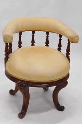 A Victorian mahogany tub shaped chair, with a padded back, spindle turned supports and a padded seat, on cabriole legs. - 2