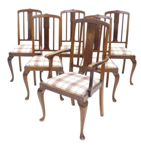 A set of six early 20thC mahogany dining chairs, each with a rail back, a gingham padded upholstered seat, on cabriole legs, one with arms.