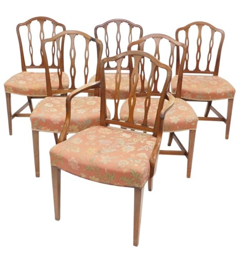 A set of six early 19thC mahogany dining chairs, each with a moulded back, with pierced supports, a shaped padded seat, on square tapering channelled legs, one with arms.