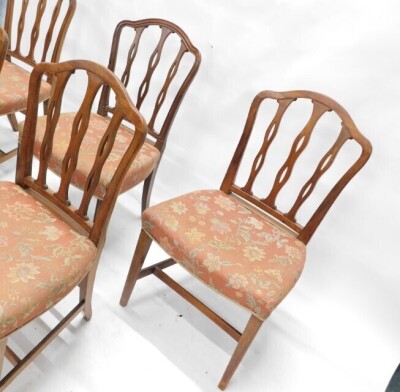 A set of six early 19thC mahogany dining chairs, each with a moulded back, with pierced supports, a shaped padded seat, on square tapering channelled legs, one with arms. - 2