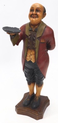 A carved and painted footman or waiter figure, on a concave base, 102cm high. - 2