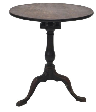 A 19thC mahogany tilt top table, the circular top on a turned column and tripod base.