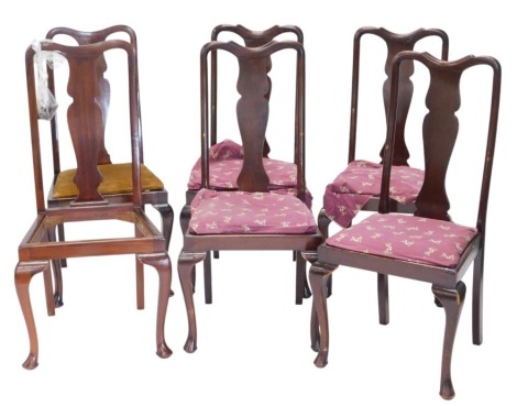 A set of eight stained beech dining chairs in Queen Anne style, each with a padded seat, on cabriole legs with pad feet.