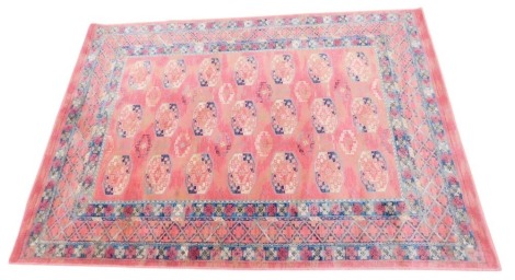 A Mossol woven rug, 240cm x 170cm.