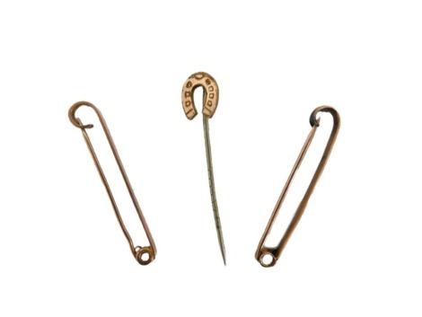 Two yellow metal stock pins, marked 9ct, 3.7g, and a gold plated horseshoe tie pin. NB. This lot will be sold for BBC Children In Need by guest novice auctioneers that have supported the BBC Bargain Hunt 2024 fund raising campaign. The full Hammer Price 