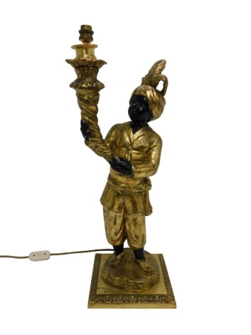 A composition gilt Blackamoor figure, on a square metal plinth, 68cm high to top of fitting. WARNING! This lot contains untested or unsafe electrical items. It is supplied for scrap or re-conditioning only. TRADE ONLY