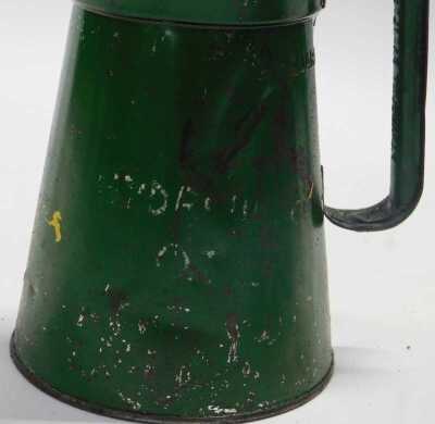 A Valor paraffin can, a one quart oil can, possibly BP, and another. (3) - 5