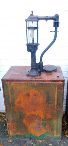 An American oil pump cabinet, with sight dispenser, 124cm high.