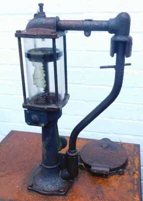 An American oil pump cabinet, with sight dispenser, 124cm high. - 2