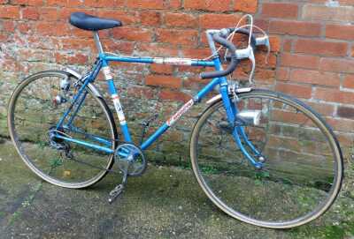 A Falcon racing bike, in blue trim.