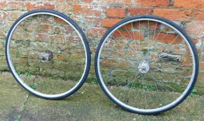 A FJ Sanders time trial bike, in green trim, with two additional wheels, together with a Curly Hetchins bicycle frame, in green, lacking wheels, frame no. J77-66. - 4