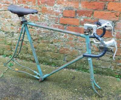 A FJ Sanders time trial bike, in green trim, with two additional wheels, together with a Curly Hetchins bicycle frame, in green, lacking wheels, frame no. J77-66. - 5