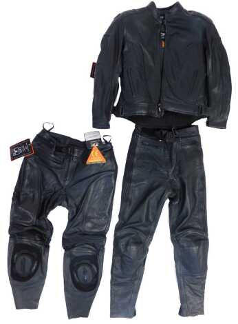 An RST women's black leather motorcycle suit, top size 14, trousers size 10.