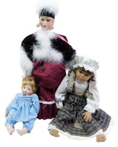 An Alberon Natalia designed by Louise Goldsborough, an Ashton Drake Galleries Hannah Needs a Hug, and a J Burner doll in gingham dress. (3)