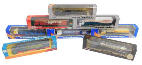 Corgi diecast tractors and trailers, including 59532 Scania curtain sider Safeway, 59572 Scania curtain sider Tesco, CC866612 2002 Manchester Commonwealth Games Scania curtain sider, TY86902 Renault cab and fuel tanker Shell, 59530 Guinness Volvo tanker, 