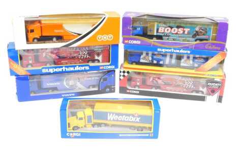 Corgi diecast tractors and trailers, including TY86801 ERF race transporter Ducati, TY86802 ERF race transporter Ducati, 59519 Cadbury's Boost Bike Team Volvo race transporter, 59522 Scania curtain sider trailer TNT, etc. (1 tray)