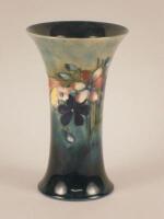 A Moorcroft Spring Flowers pattern trumpet shaped vase