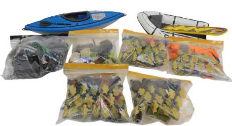 Various Action Man accessories and clothing, including kayak, snowboard, helmets, weapons, etc. (1 tray)