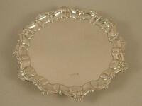 A silver waiter or salver