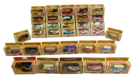 Lledo Days Gone diecast, including Cosmo's Lamp truck, Schneider's Quality Meats truck, London Transport trolley bus, Albert Daily and Son horse drawn carriage, Walkers Best Quality Crisps, Walkers Crisp van, etc. (1 box)