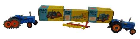 Three Corgi Toys diecast vehicles, comprising Fordson Power Major with roadless half tracks, 54, Fordson Power Major tractor, 55, Four Furrow plough, 56, boxed.