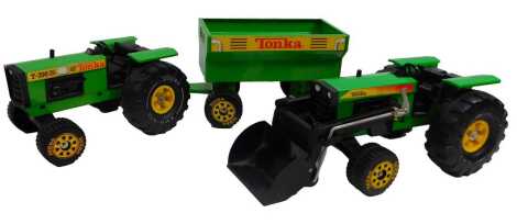 A Tonka T700 tractor in green, and a Tonka pressed steel tractor with shovel. (2)