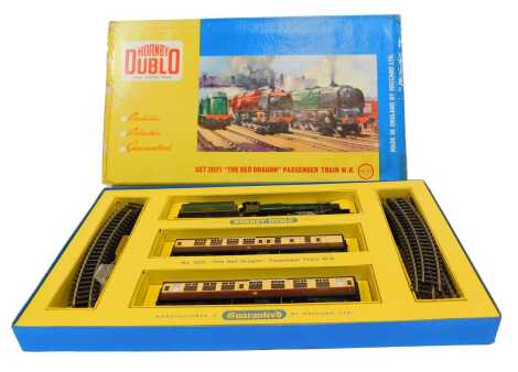 A Hornby Dublo two rail electric terrain set 2021 The Red Dragon passenger train, including Castle class locomotive 4-6-0 Cardiff Castle and two WR coaches, and oval of track, boxed.