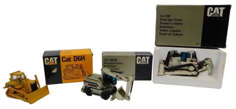 Caterpillar diecast by NZG Models, including a CAT D9R track type trailer, a Conrad Models CAT D6H track type tractor, and an NZG Models CAT M318 wheeled excavator. (3)