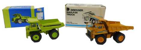 A diecast Dresser Haulpak mining truck, and a Euclid R35 dump truck, boxed. (2)