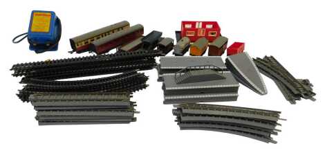 Tri-ang and other OO gauge track and rolling stock, including engine shed, platform pieces, straights, points, Saxa Salt wagon, coaches, etc. (4 boxes)