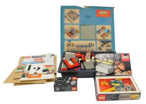 A Lego 870 supplementary set, a Lego System box, and a quantity of loose Lego and plans. (a quantity)