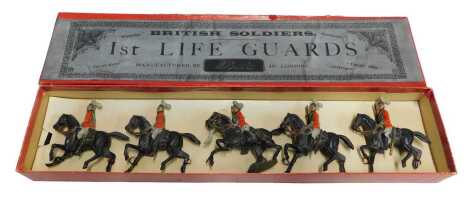 A set of five W Britain painted lead figures on horseback, Lifeguards, set number 1.