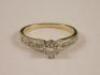 A 14ct gold diamond solitaire ring