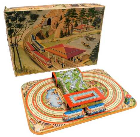 A Technofix tinplate windup twin track set, number 284, boxed.