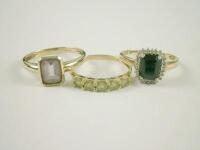 Three stone set dress rings in 9ct