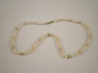 A pearl bead necklace