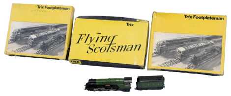 A Trix OO gauge Class A3 locomotive Flying Scotsman, 4-6-2, 4472, LNER green, boxed, and two empty Trix boxes.