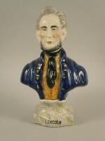 A 20thC Staffordshire type porcelain figure of Abraham Lincoln