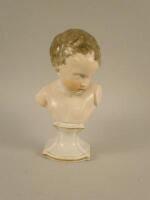An early 19thC Staffordshire pearlware bust of a young boy