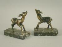 A pair of French bronzed spelter and marble figures