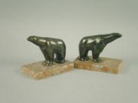 A pair of French Art Deco style bronze spelter figures of polar bears
