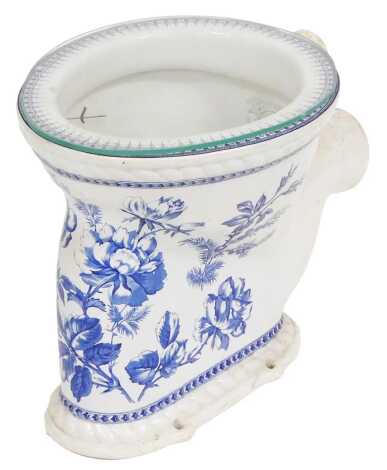 A late 19thC pottery toilet, printed in blue and white with flowers, printed internally 'Waterfall Closet, Rd No 267648', 51cm deep.