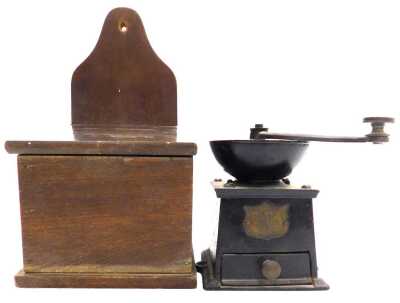 A late 19thC cast iron coffee grinder, by J&J Siddons Limited, model number 2, 11cm wide, together with a wooden salt box, 15cm wide.