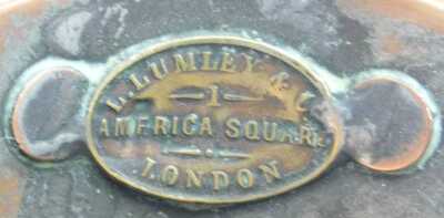 A Victorian copper half gallon flagon, by L Lumley and Company, One America Square, London, together with a copper saucepan and lid, and a brass mortar. (3) - 5