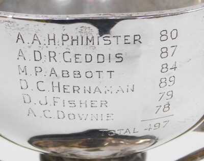 A 20thC Indian colonial silver trophy, of triple handle form, engraved 'Merchants Golf Cup, Calcutta 1957, National Bank of India Ltd', verso winner's names, Hamilton & Co, Calcutta & New Delhi, 9.72oz, with an ebonised socle. - 2