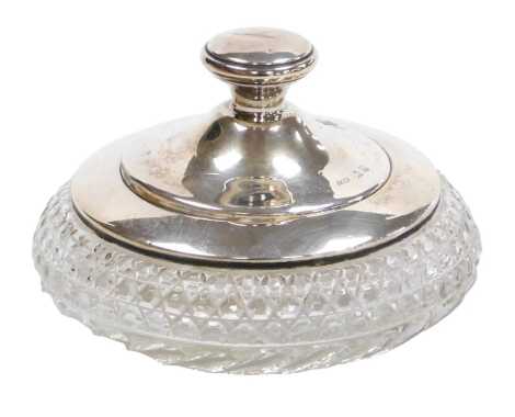 A George V cut glass and silver mounted powder bowl, the lid with mirror inset, probably Birmingham 1925.