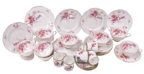 A Tuscan porcelain Fragrance pattern part tea service, comprising eight teacups, saucers and plates, together with a Paragon part coffee service, printed with birds and flowers, comprising five demitasse coffee cans and saucers.