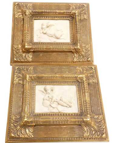 After Leon Bertaux (French 1825-1909). A pair of faux marble plaques, of cherubs, 12.5cm x 17.5cm, within gilt frames.