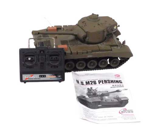 A Heng Long remote control USM26 Pershing battle tank, scale 1/16, with remote and instruction manual.